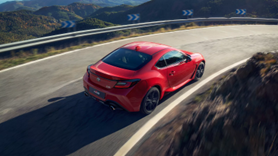 Hero image - Toyota GR86 on the road with GR badge